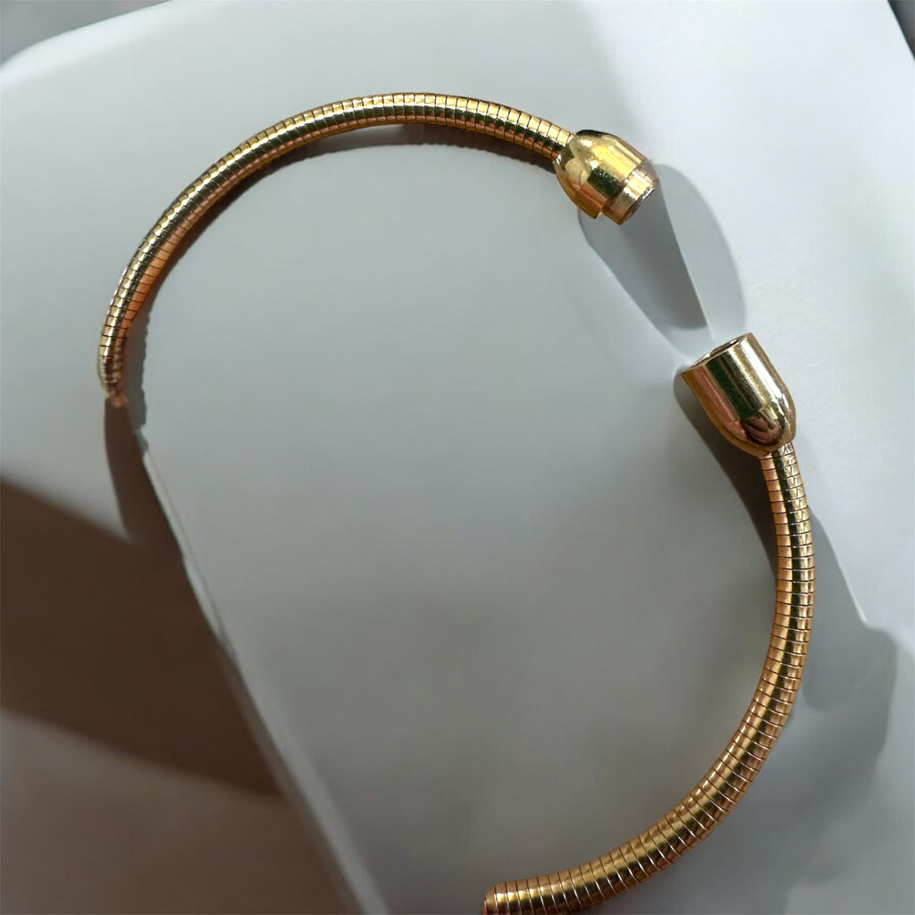 Take a Chance magnetic gold bangle